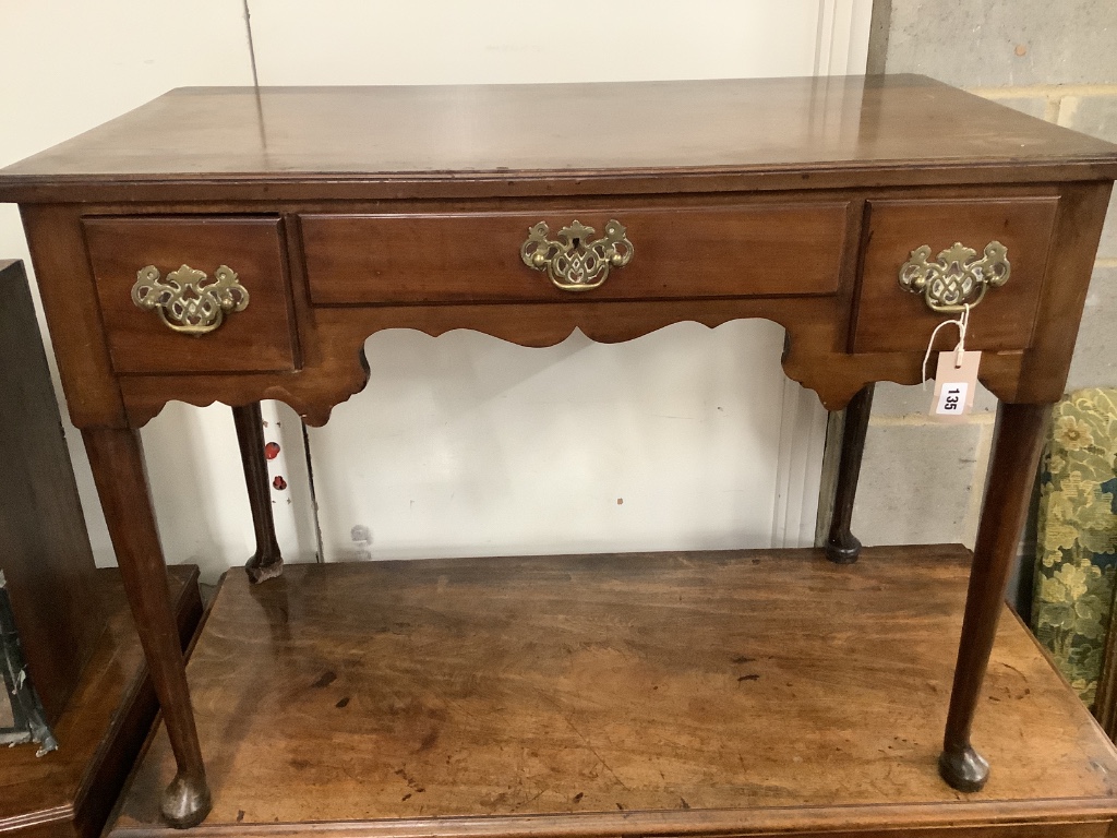 A George III mahogany lowboy fitted three short drawers, width 92cm depth 50cm height 69cm